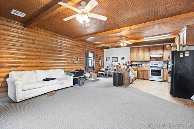 living room with visible vents, beamed ceiling, and wood ceiling