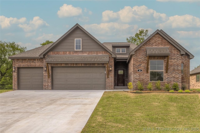 view of front of house with brick siding, a garage, a front lawn, driveway, and a shingled roof