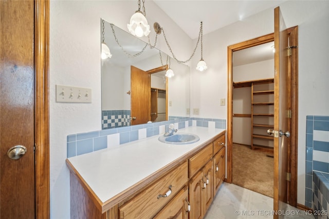 601 N Okmulgee Ave, Okmulgee, OK 74447 - full bathroom featuring vanity and backsplash