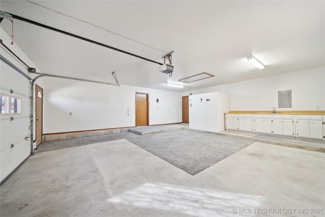 601 N Okmulgee Ave, Okmulgee, OK 74447 - garage with a garage door opener and electric panel