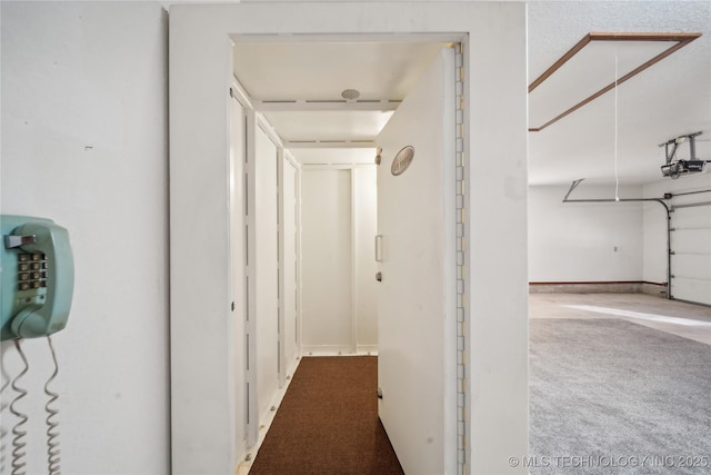 601 N Okmulgee Ave, Okmulgee, OK 74447 - hall featuring baseboards and carpet floors