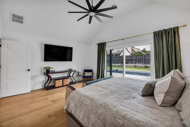 11529 S Marion Ave, Tulsa, OK 74137 - bedroom featuring access to exterior, wood finished floors, a ceiling fan, and high vaulted ceiling