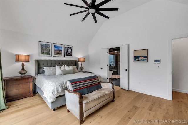 11529 S Marion Ave, Tulsa, OK 74137 - bedroom with high vaulted ceiling, light wood-style floors, connected bathroom, baseboards, and ceiling fan