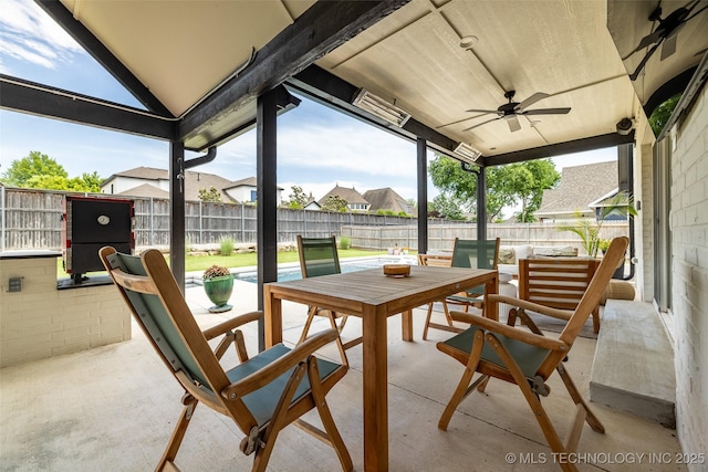 11529 S Marion Ave, Tulsa, OK 74137 - fenced backyard featuring outdoor dining space, a patio, and a ceiling fan