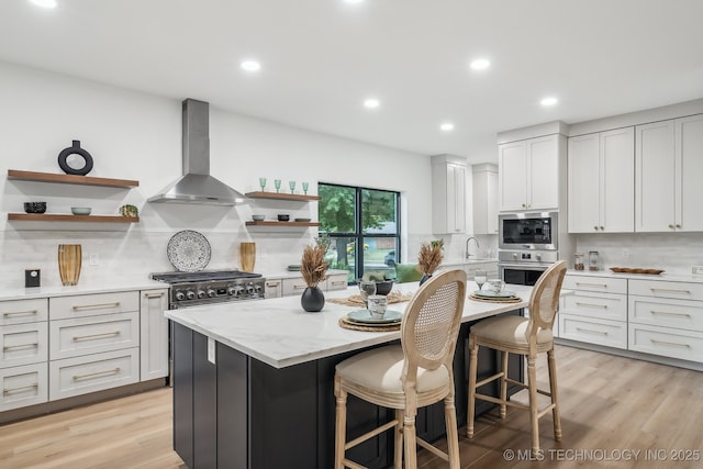 kitchen with wall chimney exhaust hood, open shelves, and tasteful backsplash