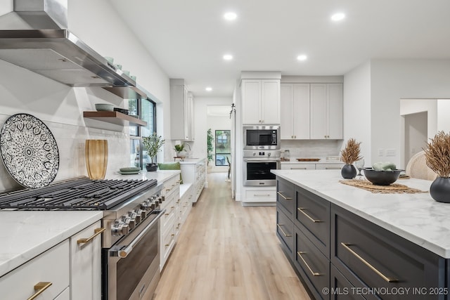 kitchen with open shelves, white cabinets, appliances with stainless steel finishes, recessed lighting, and light wood finished floors