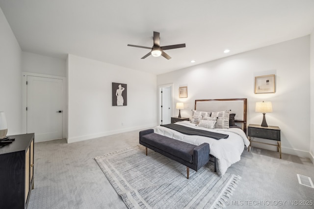 bedroom featuring recessed lighting, light colored carpet, baseboards, visible vents, and a ceiling fan
