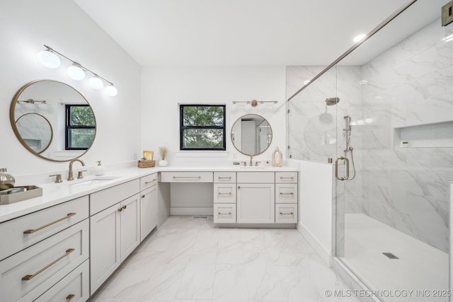 full bathroom with vanity, a marble finish shower, a wealth of natural light, and marble finish floor