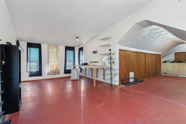 bonus room featuring vaulted ceiling