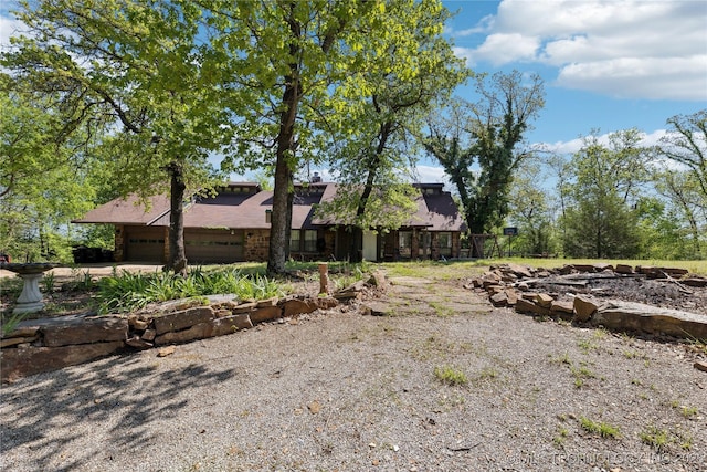 view of property exterior with a garage
