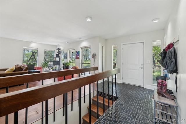 entrance foyer featuring recessed lighting and baseboards