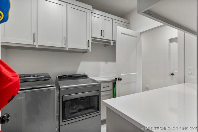 13722 S 20th Pl E, Bixby, OK 74008 - laundry room featuring separate washer and dryer and cabinet space