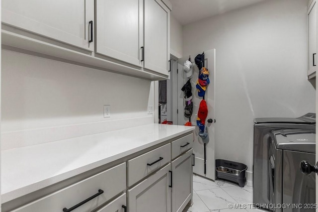 13722 S 20th Pl E, Bixby, OK 74008 - laundry area featuring separate washer and dryer, cabinet space, and marble finish floor