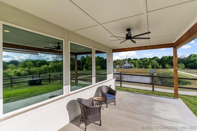 13722 S 20th Pl E, Bixby, OK 74008 - view of patio featuring a sunroom, ceiling fan, and fence