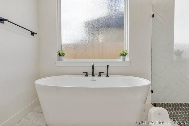 13722 S 20th Pl E, Bixby, OK 74008 - full bathroom featuring marble finish floor, a freestanding tub, and baseboards