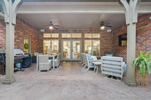 view of patio / terrace featuring ceiling fan, outdoor dining area, and french doors