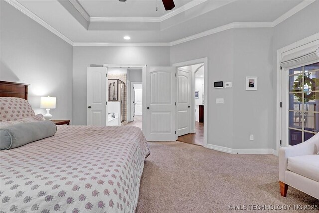 bedroom with recessed lighting, a raised ceiling, crown molding, baseboards, and carpet floors