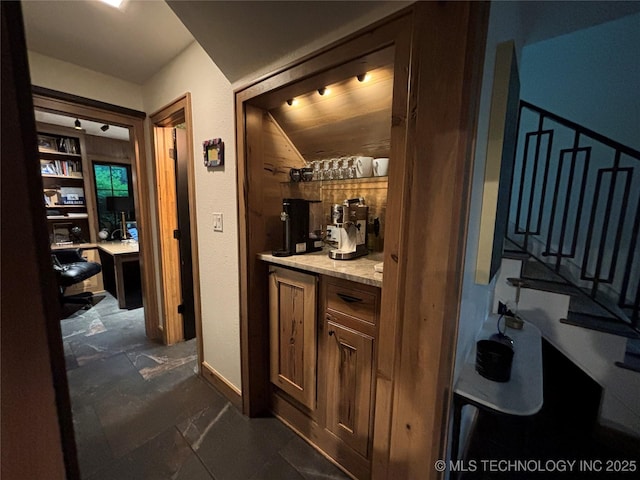 interior space with baseboards