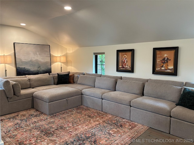 living room featuring recessed lighting, wood finished floors, and lofted ceiling
