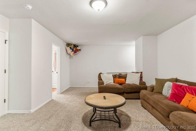 7305 S Walnut Ave, Broken Arrow, OK 74011 - carpeted living room featuring baseboards