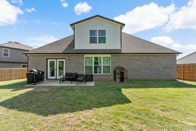 7305 S Walnut Ave, Broken Arrow, OK 74011 - back of property with a patio, brick siding, and a shingled roof