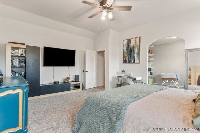 7305 S Walnut Ave, Broken Arrow, OK 74011 - carpeted bedroom featuring arched walkways, ceiling fan, and baseboards
