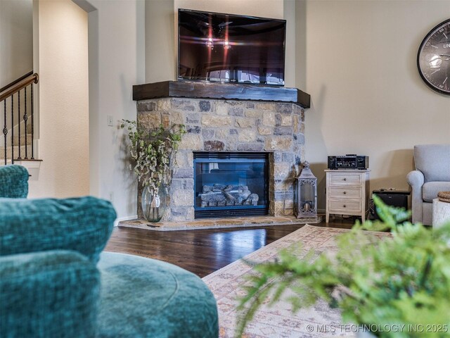 16321 E 48th Pl, Tulsa, OK 74134 - living room with stairway, wood finished floors, and a fireplace