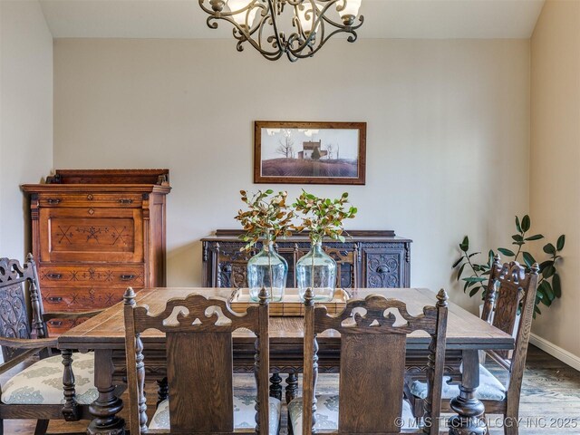 16321 E 48th Pl, Tulsa, OK 74134 - dining space with a chandelier, baseboards, and wood finished floors