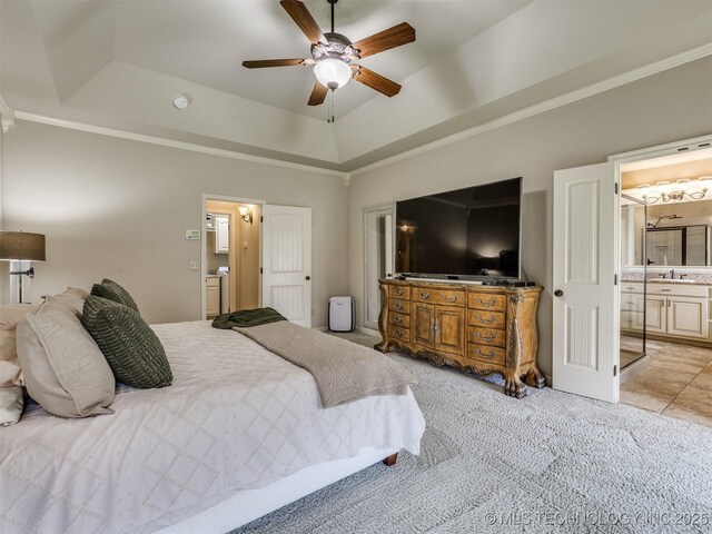 16321 E 48th Pl, Tulsa, OK 74134 - bedroom with ensuite bath, ceiling fan, light carpet, a raised ceiling, and crown molding