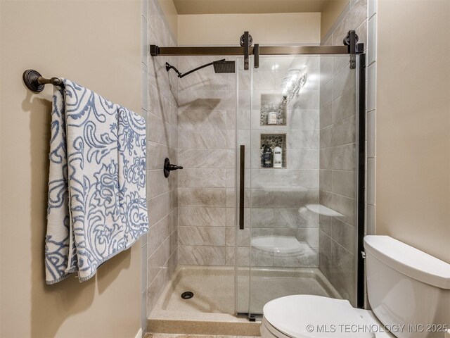 16321 E 48th Pl, Tulsa, OK 74134 - bathroom featuring toilet and a shower stall