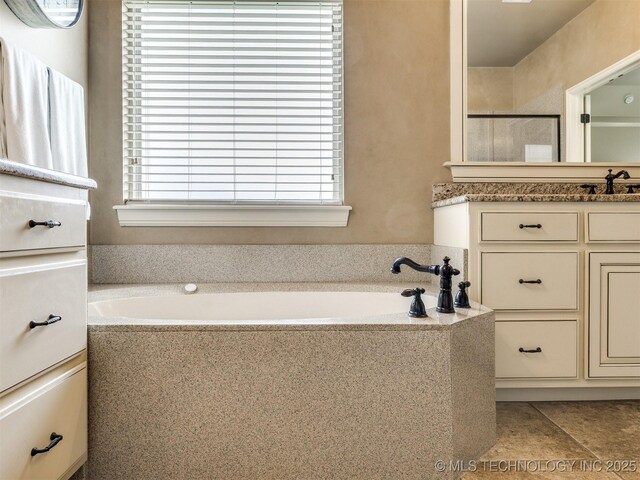 16321 E 48th Pl, Tulsa, OK 74134 - bathroom with an enclosed shower, a garden tub, and vanity
