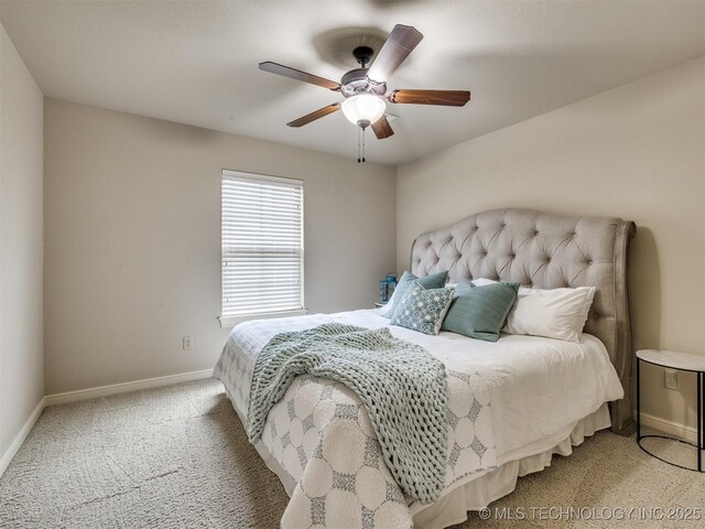 16321 E 48th Pl, Tulsa, OK 74134 - bedroom with a ceiling fan, light colored carpet, and baseboards