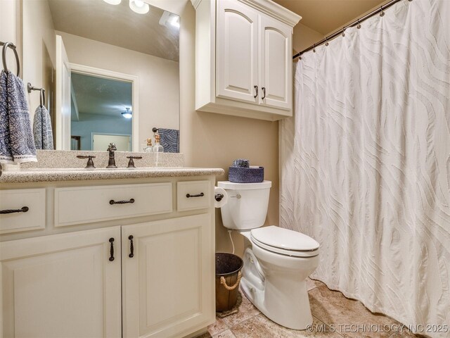 16321 E 48th Pl, Tulsa, OK 74134 - bathroom featuring tile patterned floors, vanity, and toilet