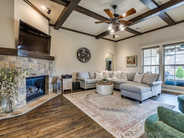 16321 E 48th Pl, Tulsa, OK 74134 - living area featuring coffered ceiling, arched walkways, beam ceiling, dark wood finished floors, and a ceiling fan