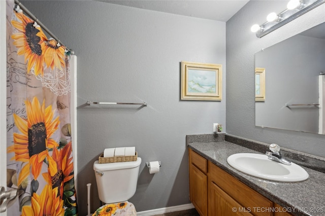 11213 N 120th E Ave, Owasso, OK 74055 - bathroom featuring toilet, curtained shower, and vanity