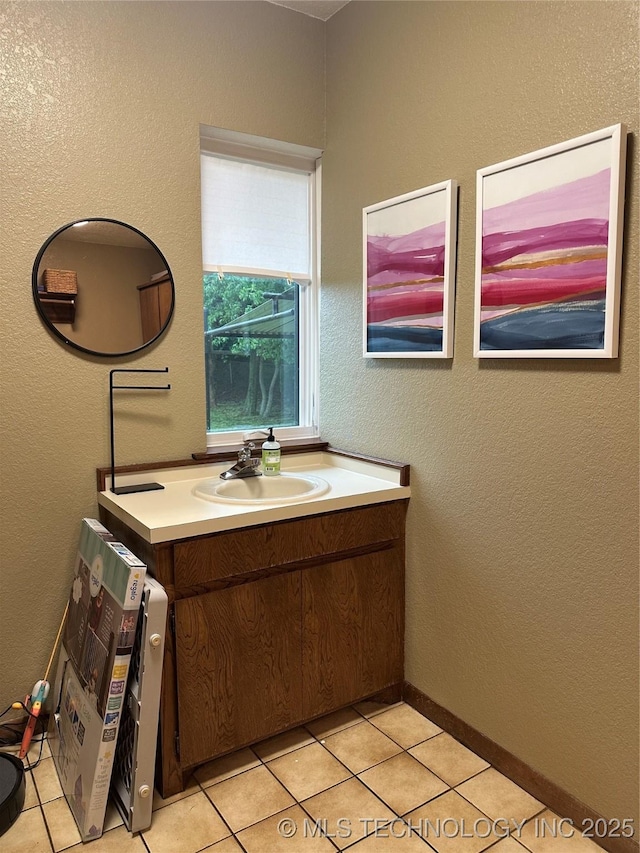2621 Chuckwa St, Durant, OK 74701 - bathroom featuring tile patterned flooring and vanity