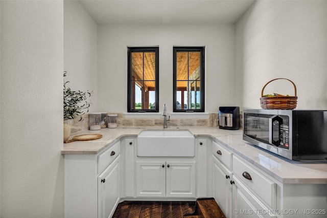 5393 W 184th St S, Mounds, OK 74047 - bar featuring stainless steel microwave, dark wood-style floors, and a sink