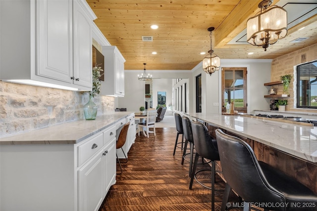 5393 W 184th St S, Mounds, OK 74047 - kitchen featuring light stone countertops, an inviting chandelier, crown molding, white cabinetry, and wood ceiling
