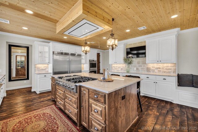 5393 W 184th St S, Mounds, OK 74047 - kitchen featuring wood ceiling, stainless steel appliances, crown molding, and a center island