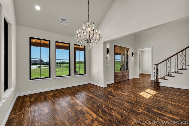 5393 W 184th St S, Mounds, OK 74047 - interior space with visible vents, an inviting chandelier, wood finished floors, high vaulted ceiling, and stairs