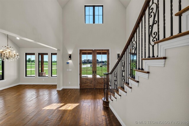 5393 W 184th St S, Mounds, OK 74047 - entrance foyer with stairway, a chandelier, plenty of natural light, and hardwood / wood-style flooring