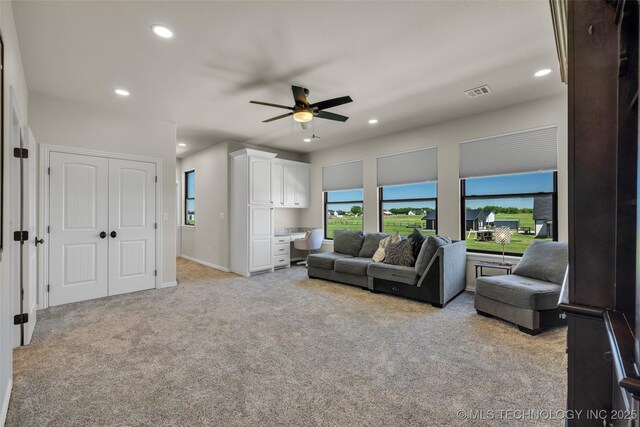 5393 W 184th St S, Mounds, OK 74047 - living room featuring recessed lighting, ceiling fan, light colored carpet, and visible vents