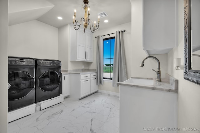 5393 W 184th St S, Mounds, OK 74047 - washroom featuring washing machine and dryer, visible vents, an inviting chandelier, cabinet space, and marble finish floor