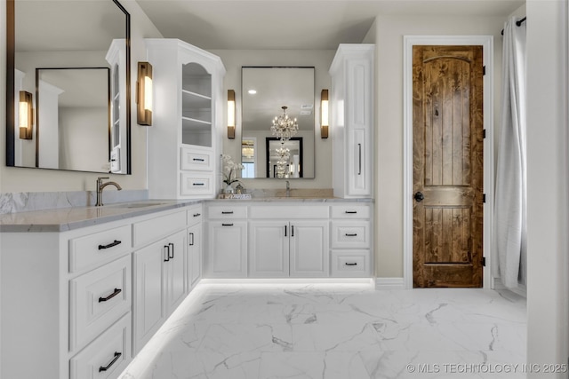 5393 W 184th St S, Mounds, OK 74047 - bathroom featuring a notable chandelier, marble finish floor, and vanity