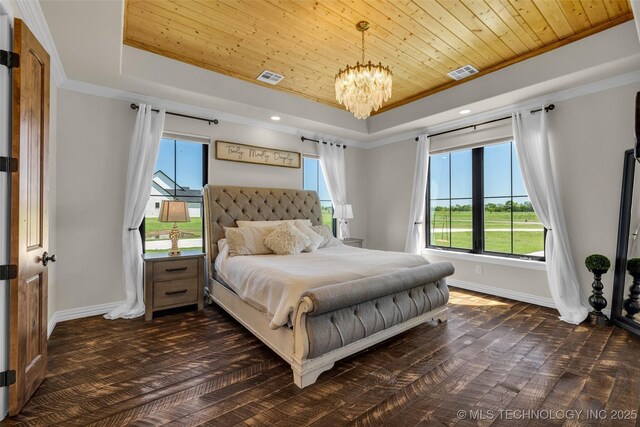 5393 W 184th St S, Mounds, OK 74047 - bedroom with an inviting chandelier, visible vents, a tray ceiling, and multiple windows