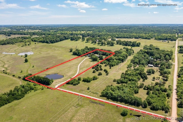 aerial view of sparsely populated area featuring property boundaries highlighted