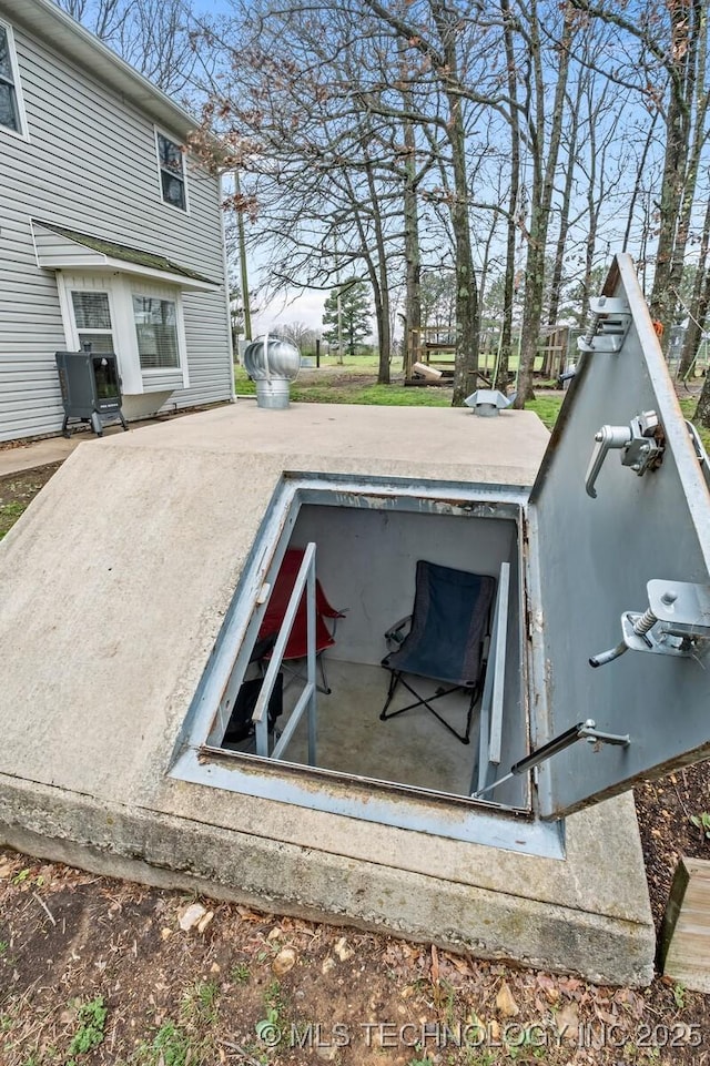 view of entry to storm shelter