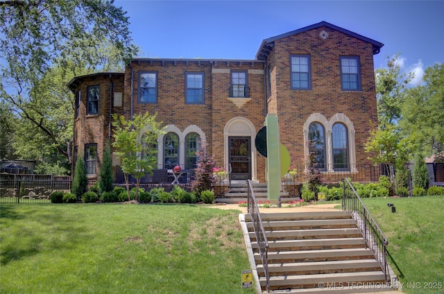 2156 S Owasso Pl, Tulsa, OK 74114 - view of front facade with brick siding, a front lawn, and fence