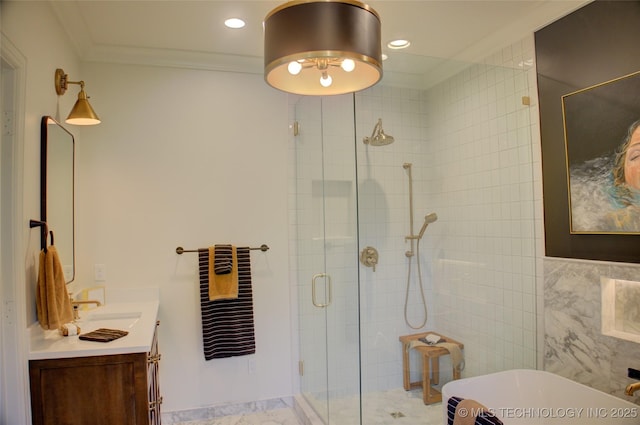 2156 S Owasso Pl, Tulsa, OK 74114 - bathroom featuring a shower stall, vanity, ornamental molding, a soaking tub, and recessed lighting