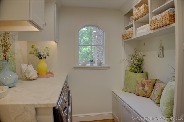 2156 S Owasso Pl, Tulsa, OK 74114 - mudroom featuring baseboards